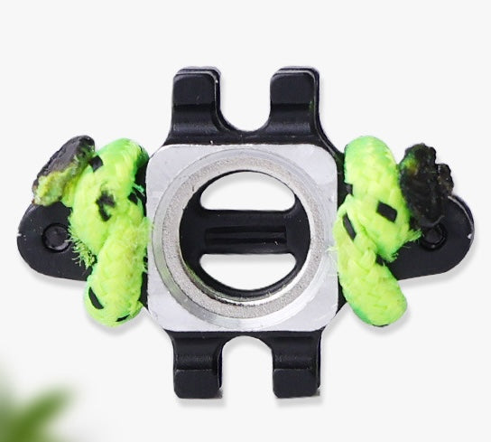 Falcon Bow center-fire steel ball rest close-up with aluminum alloy center ring, black mounting plate and green braided support cord