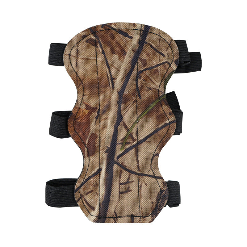 Woodland camo archery arm guard with three adjustable straps for bow hunting forearm protection